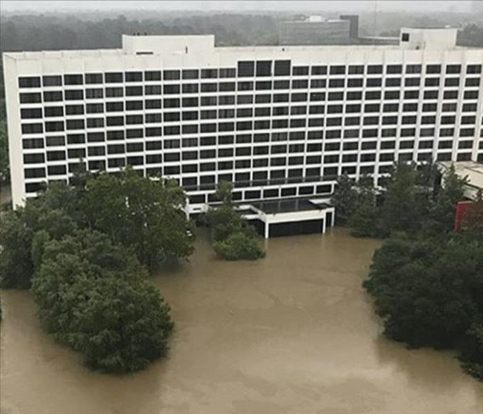 exterior photo of a hotel flooded