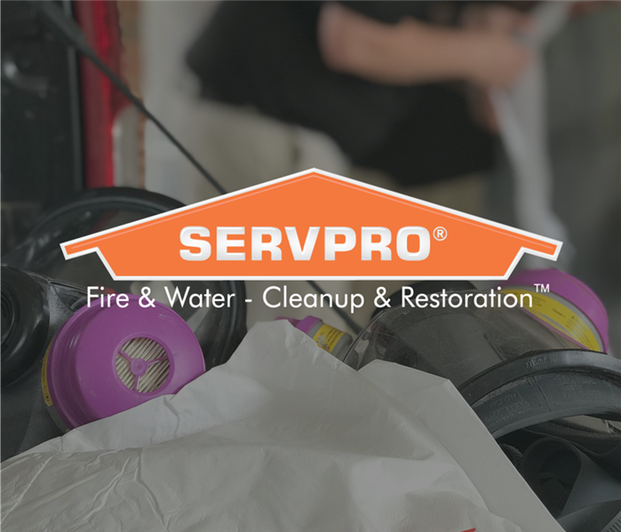 SERVPRO logo over a photo of the SERVPRO mask and uniform